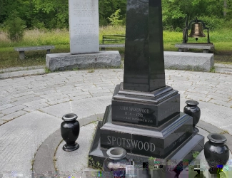 Memorial patio, statue, and tablets about the settlers of the Spotswood community