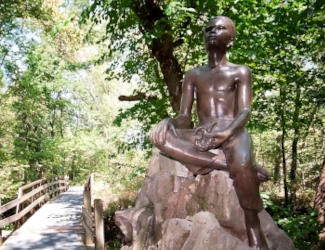 Statue of Carver as a boy.